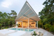 01 This contemporary villa is built in a remote part of Costa Rica and features all white and an angular roof