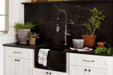 black and white kitchen design with some marble