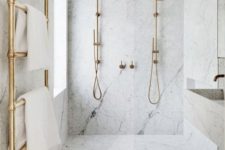 an elegant white marble shower area design