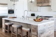 18 a neutral modern farmhouse kitchen with statement glass and metal lights over the kitchen island