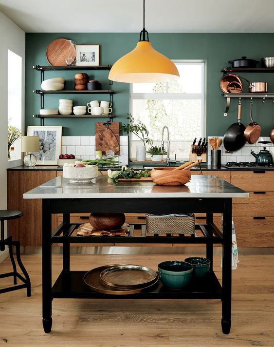 a functional kitchen island with two open shelves under the tabletop is a stylish and practical idea