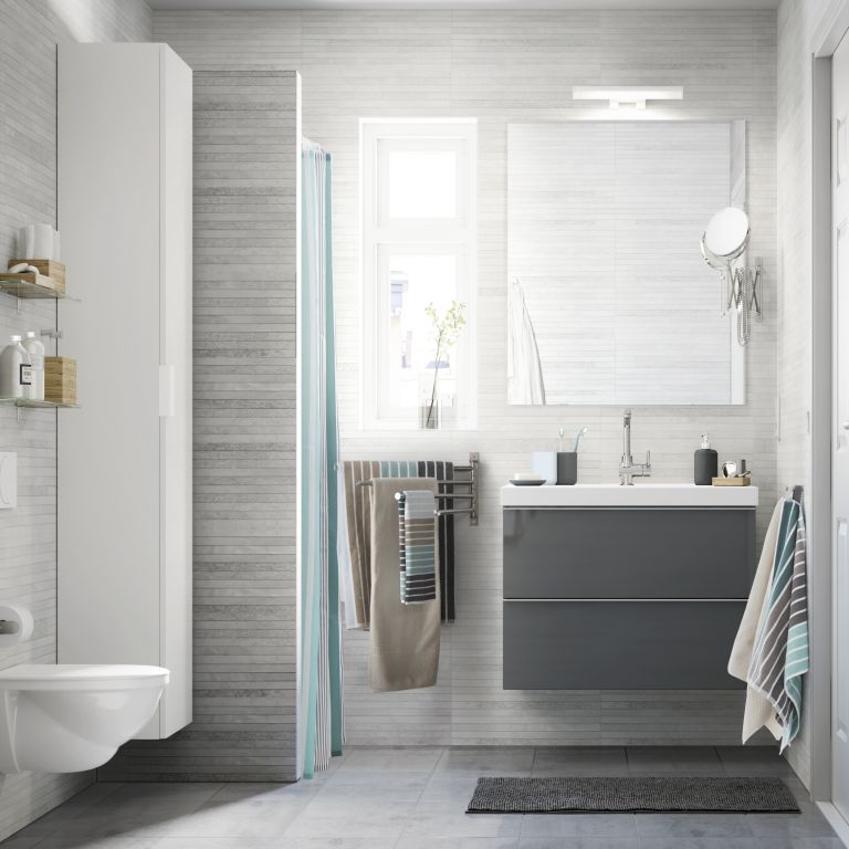 a wall-mounted multi-rail towel storage piece is a smart and cool towel storage unit for any bathroom