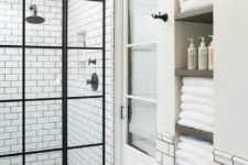 26 built-in shelves in the wall allow storing a lot of towels and bathroom stuff comfortably and without clutter