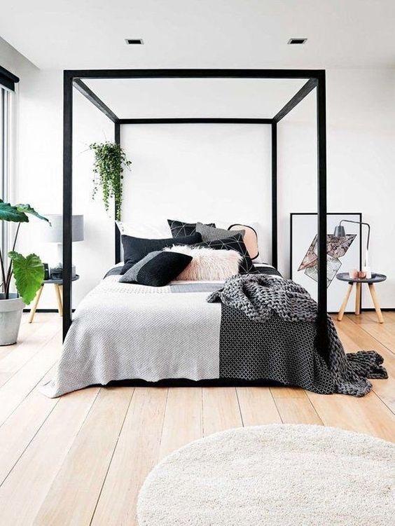 a black framed bed is a nice modern touch to your bedroom, and if you don't have it - just paint the existing one