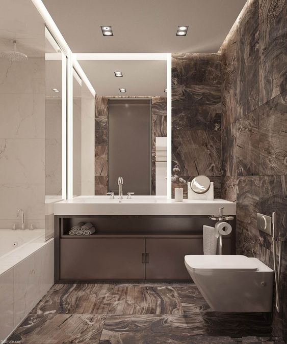 a minimalist bathroom with brown marble tiles, white appliances and stone surfaces is super chic