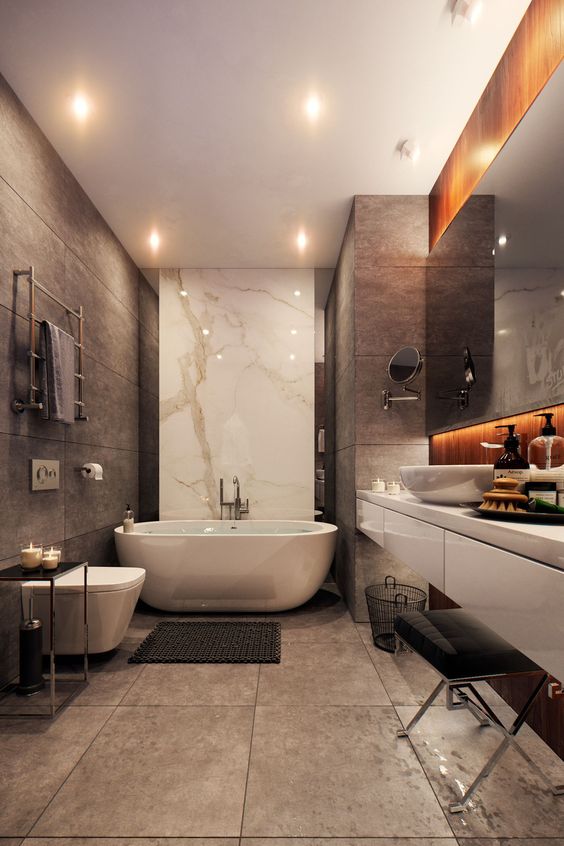 a stylish contemporary bathroom with light brown tiles, tan tiles, white marble and white appliances