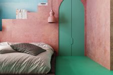 03 The master bedroom features Moroccan flavor, with a pink plaster wall, emerald doors, a weathered platform bed