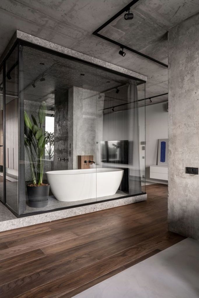 The bathroom is at the center of the apartment and has a stylish and sophisticated design