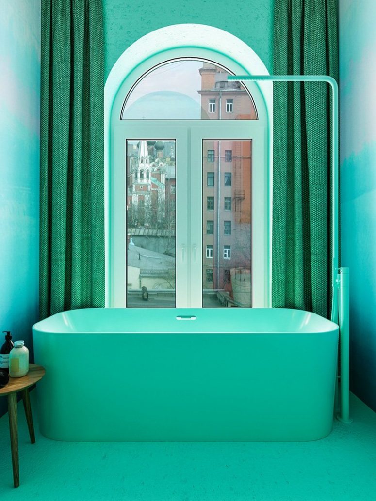 The master bathroom was done in green hues, with a window to enjoy the views of the city