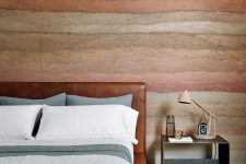 09 The canyon-inspired accent wall is continued in this bedroom, too