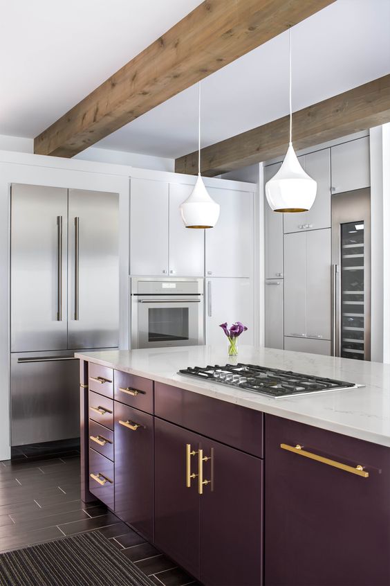 a stylish contemporary kitchen in white accented with a bold purple kitchen island and touches of gold is wow