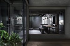 01 This apartment in Taiwan was renovated in a moody grey color palette, and the basement space was refreshed to make it functional