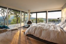 05 Bedrooms like this one feature fantastic views thanks to extensive glazing