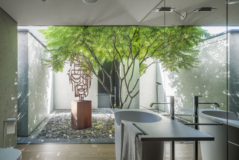 Several indoor gardens were included into the design as a way to bring the outdoors in and to blue the boundaries between architecture and nature