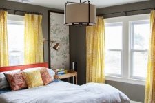 a stylish bedroom design in grey and yellow colors