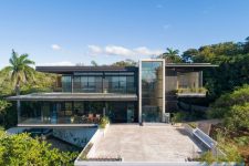 01 This amazing Costa Rica home is built with two horizontal floor planes plus a vertical volume and overlooks the ocean