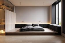 05 The bedroom is all-minimalist, with a bed on a platform and built-in lights