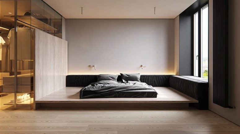 The bedroom is all-minimalist, with a bed on a platform and built-in lights