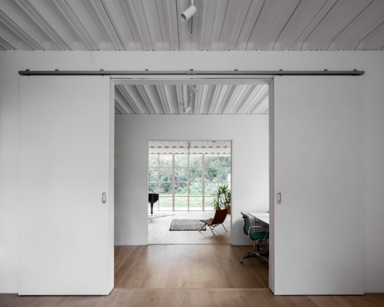 The spaces are divided with sliding doors that save space