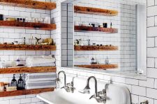 05 staiend wooden slab open shelves soften the vintage industrial bathroom making it look warmer