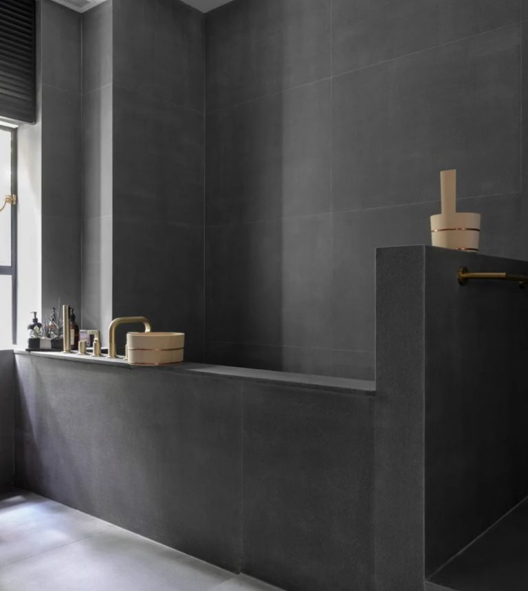 The bathroom is inspired by traditional Japanese ones as the family are Japanese