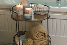 12 a rustic rolling cart of blackened steel and wooden tiers is a stylish idea for a rustic or vintage space