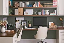 a farmhouse home office with kitchen cabinets, an L-shaped desk, white chairs, various stuff on the open shelves