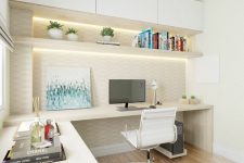 a minimalist white home office with a large L-shaped desk, an open shelf and a storage unit, a rug and some built-in lights