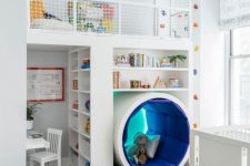 04 a unique kids’ room with a study space, a reading sphere, an upper sleeping space and a climbing wall