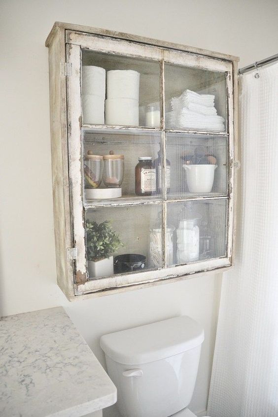 a shabby chic cabinet is a nice addition to a bathroom's decor
