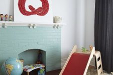 15 a non-working mint blue brick fireplace finishes off the playroom making it cozier and more welcoming