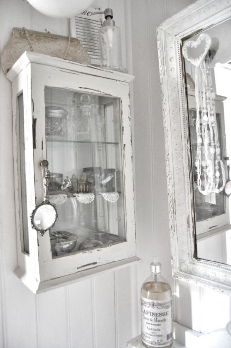 a vintage glass cabinet made of old window frames will be a beautiful solution for a kitchen or a bathroom