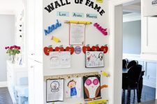 17 a wall of fame is a gorgeous way to make your kids feel proud of what they have created
