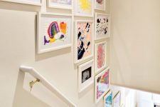 20 a stylish gallery wall over the staircase will display your kids’ works at their best and they will be seen any time
