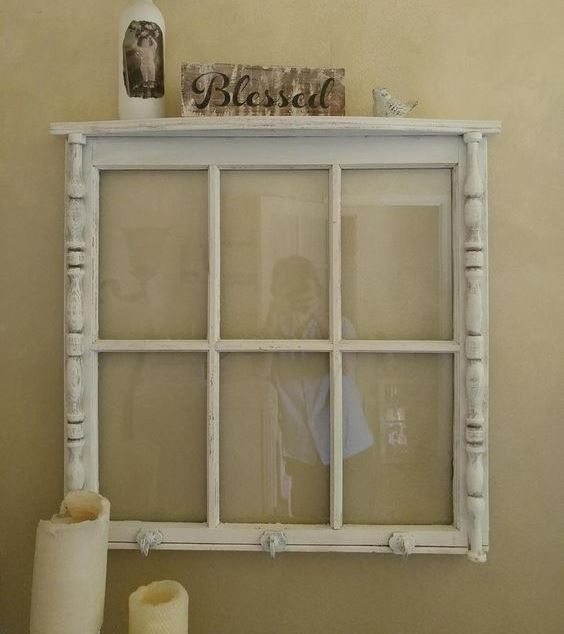 a window frame used as a shelf is a stylish idea for a rustic, shabby chic or just vintage interior and will look cool