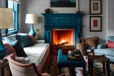 24 a teal fireplace is a natural solution for a coastal living room and other teal items echo with it perfectly creating a cohesive look
