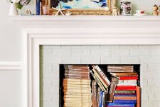 a non-working fireplace with magazines and books inside is a cool idea for storage, these books also add some color