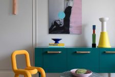 Bright artworks like these ones can be seen throughout the dwelling
