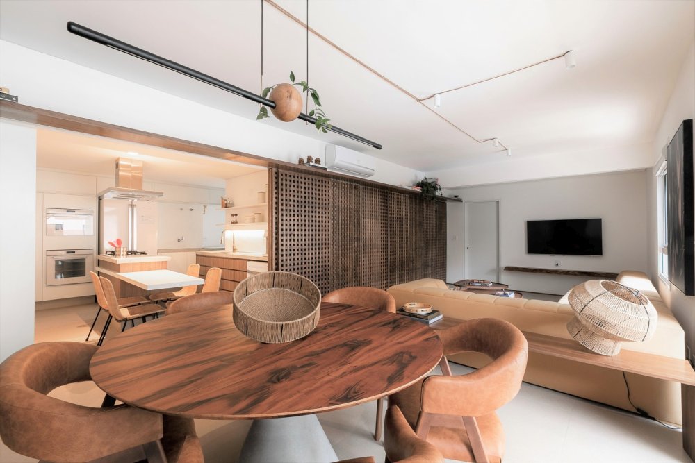 The wood adds a lot of warmth to this apartment along with other nature inspired materials such as ceramic, granite and leather