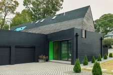 01 This stylish modern house is built in NYC suburbs and its facade is inspired by 1930s houses that surround it