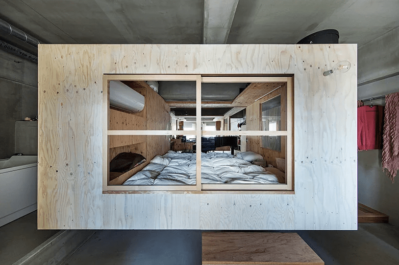 Minimalist House With A Suspended Nest Inside