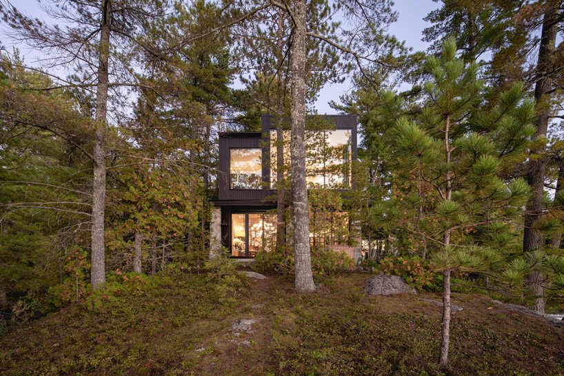 02 The house is located in the forest on the lakeshore, so it has amazing views and feels very peaceful both inside and outside