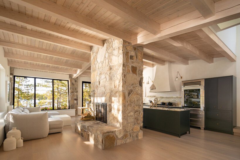 a cozy stone fireplace is a must for a log cabin