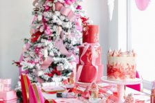 a bright Christmas space decorated in red, pink and gold, with paper fans, ribbons and ornaments is a bold idea