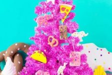 a hot pink Christmas tree decorated with junk food clay ornaments is a very bold color statement that inspired and strikes