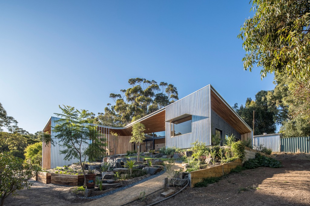 This gorgeous house is a retrirement residence designed around a garden and views