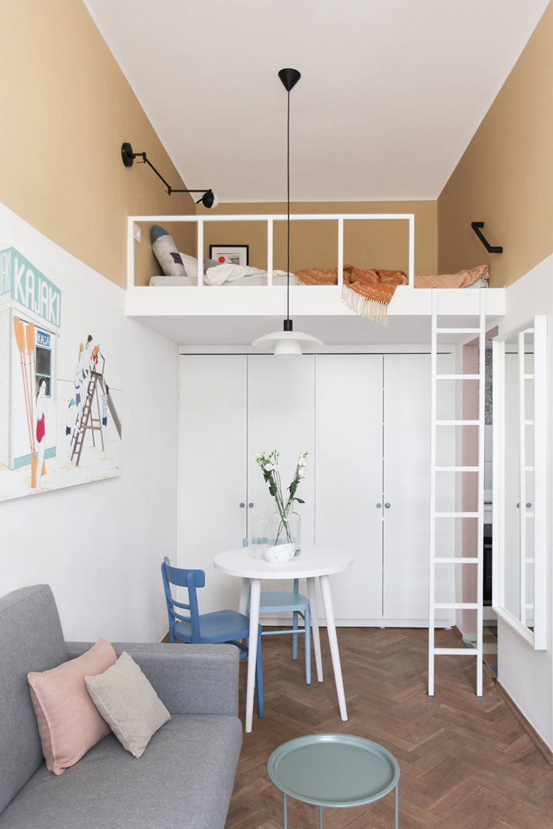 01 This tiny apartment is just 23 sqm and is done in a soft pastel color palette for a girl