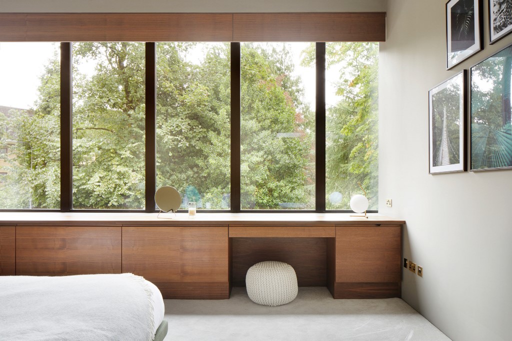08 Bespoke walnut joinery features in the bedrooms