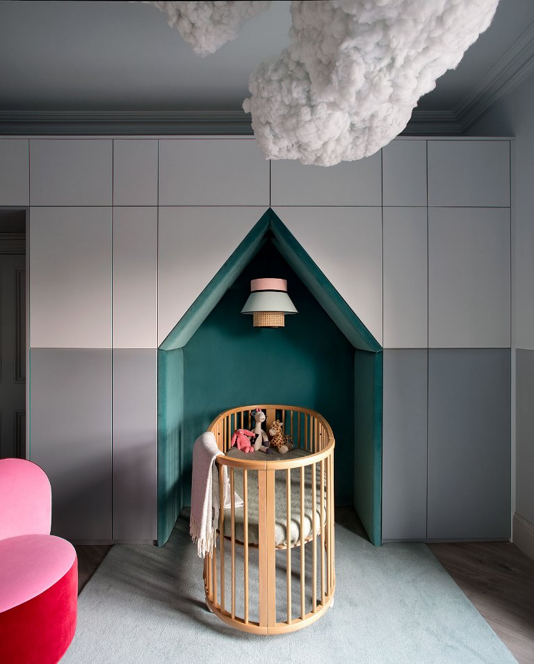 The nursery features both bold colors, geometry and looks amazing