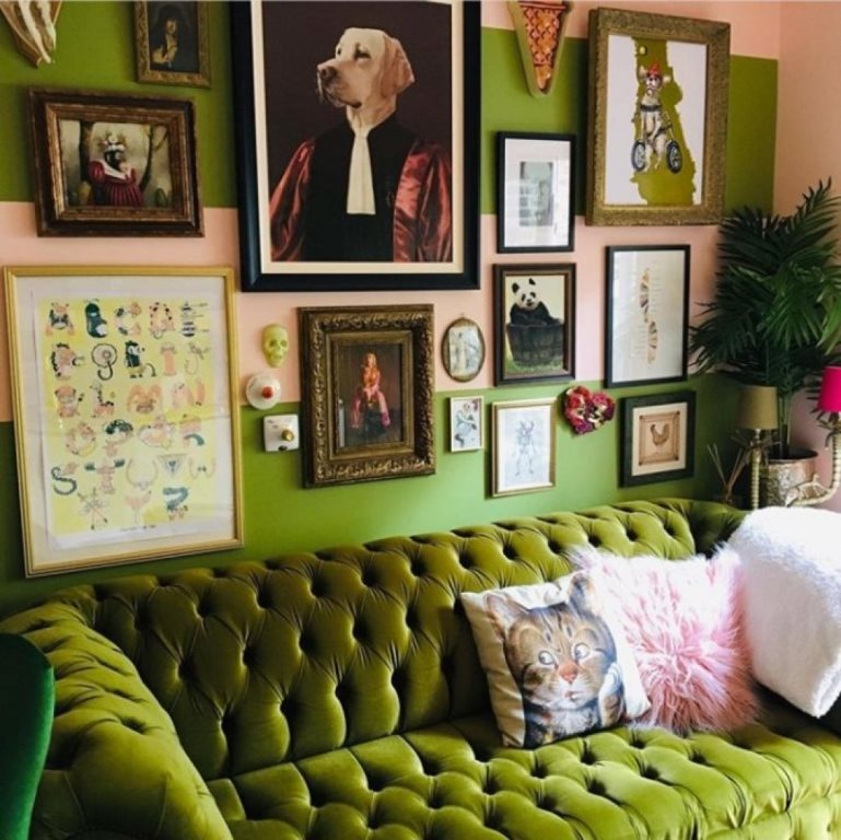 16 a bold maximalist living room with green walls and furniture, a gallery wall with bright artworks and potted plants